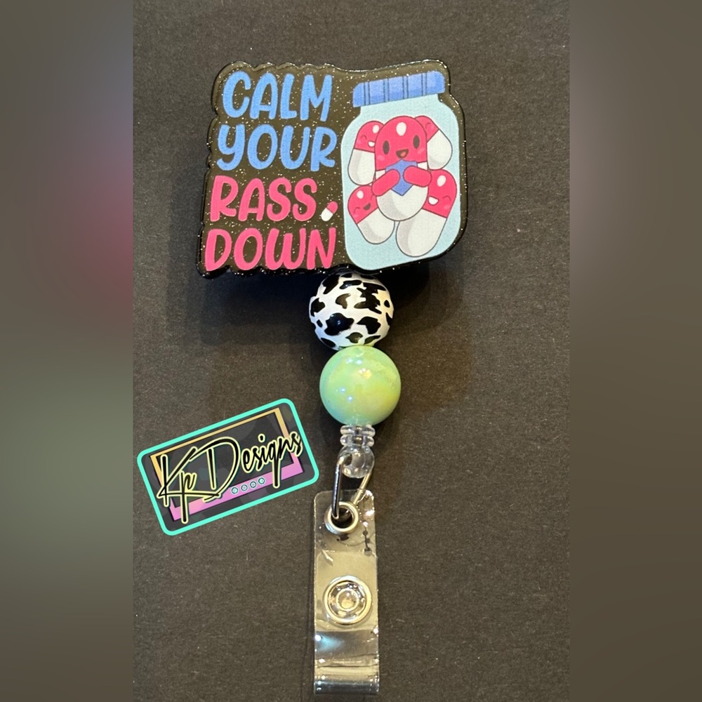 Badge reel with beads